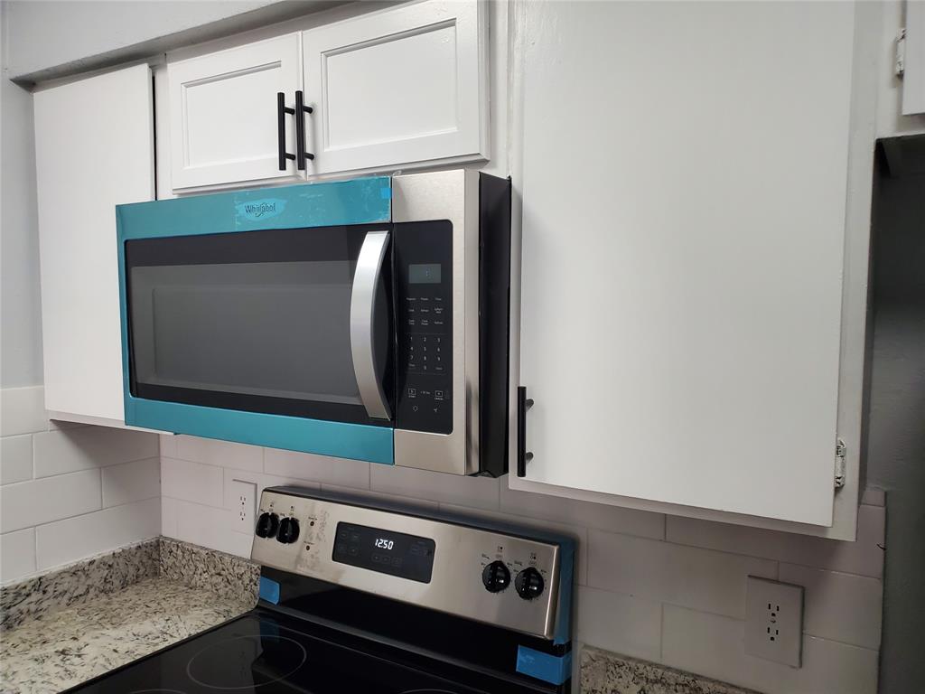 12482 Abrams Road, Unit 1402 Dallas, TX 75243 - Photo 13 of 32 a utility room with washer and dryer