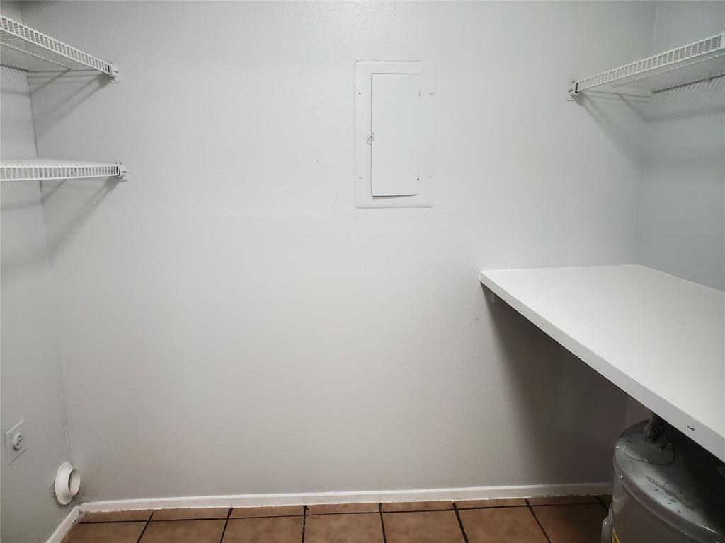 12482 Abrams Road, Unit 1402 Dallas, TX 75243 - Photo 14 of 32 a view of small space with racks on the wall