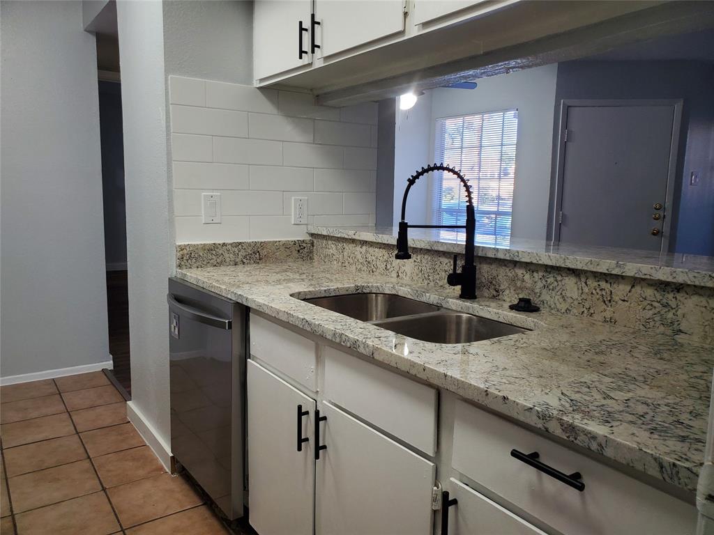 12482 Abrams Road, Unit 1402 Dallas, TX 75243 - Photo 16 of 32 a close view of a sink and dishwasher in kitchen