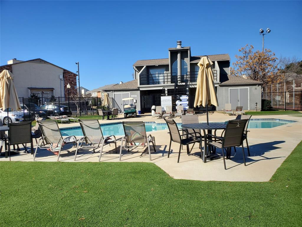 12482 Abrams Road, Unit 1402 Dallas, TX 75243 - Photo 31 of 32 a view of a house with sitting area and a swimming pool