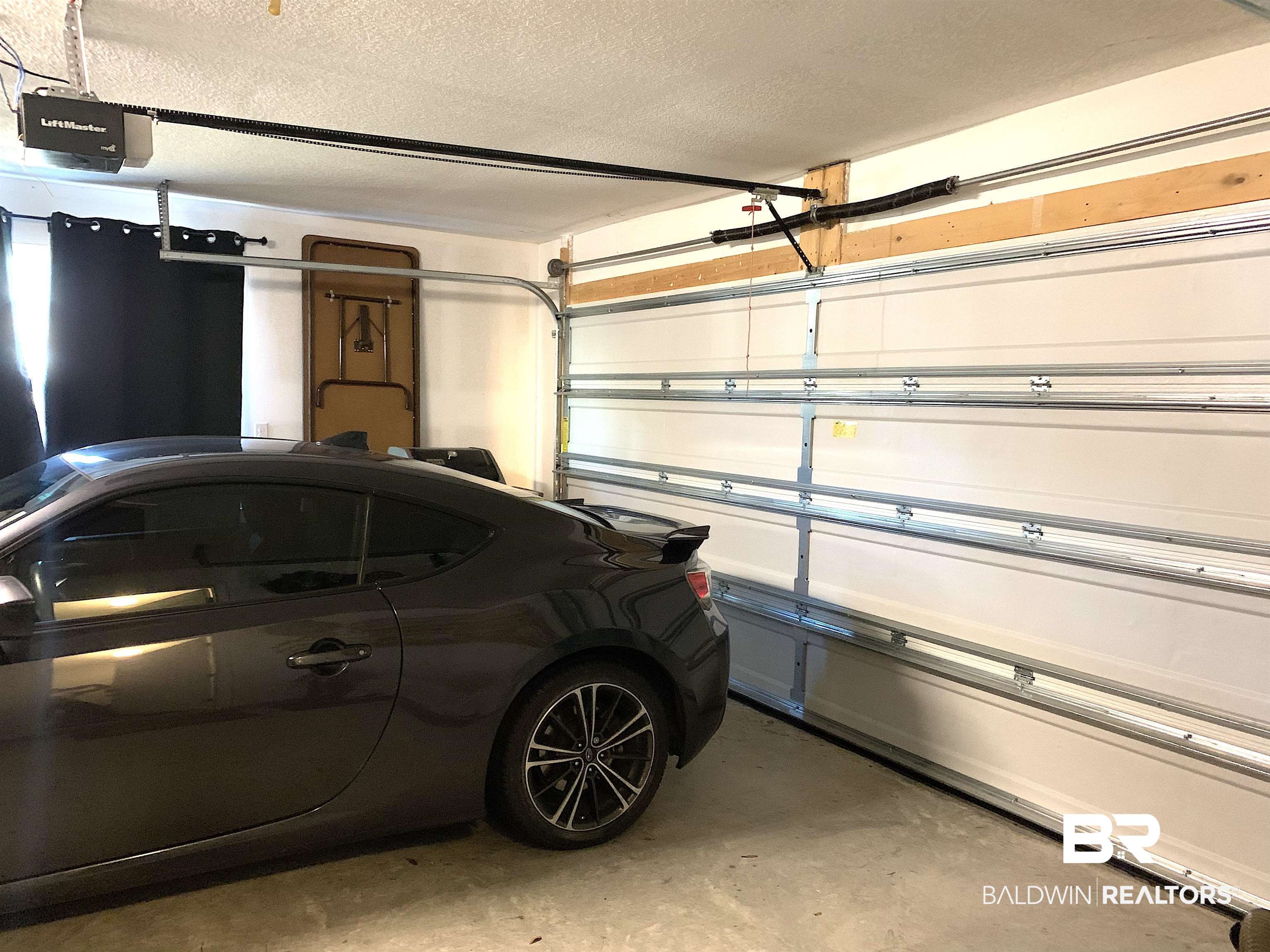12092 Chaucer Avenue Daphne, AL 36526 - Photo 25 of 27 Garage