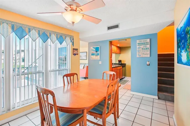a kitchen that has a sink and a stove