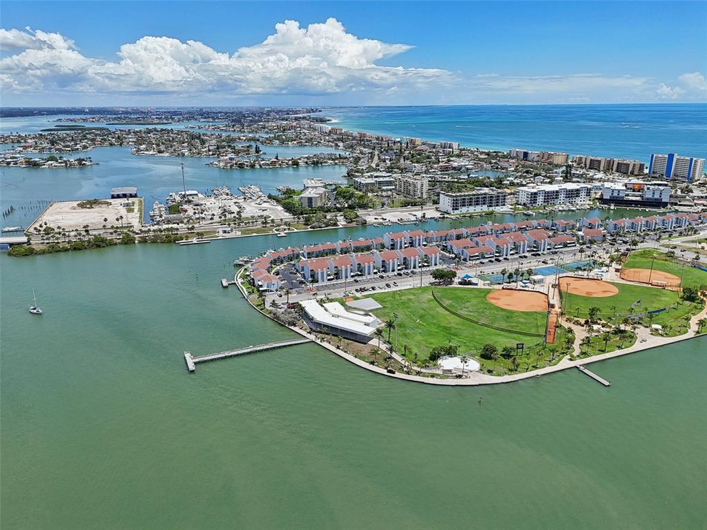 343 Rex Place, Unit F Madeira Beach, FL 33708 - Photo 22 of 28 a view of a lake with a city