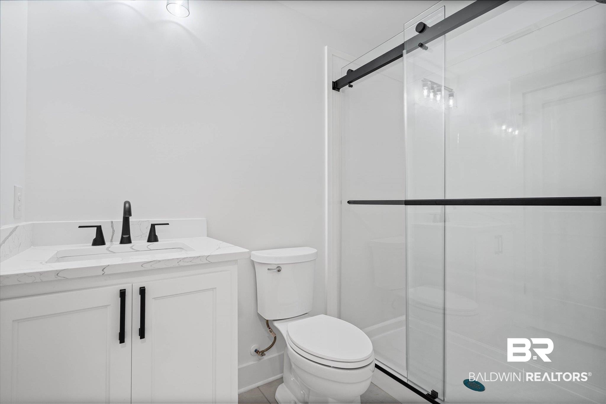 11 Schwaemmle Drive Mobile, AL 36608 - Photo 19 of 32 Full bathroom with vanity and a shower stall