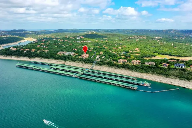 a view of a lake with a big yard