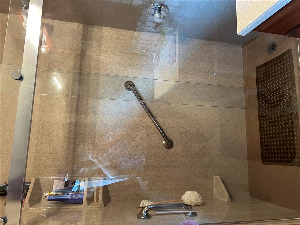 6830 Gun Club Road Coopersburg, PA 18036 - Photo 29 of 30 Step into a spacious, well-appointed shower featuring smooth tile flooring and a convenient grab bar.