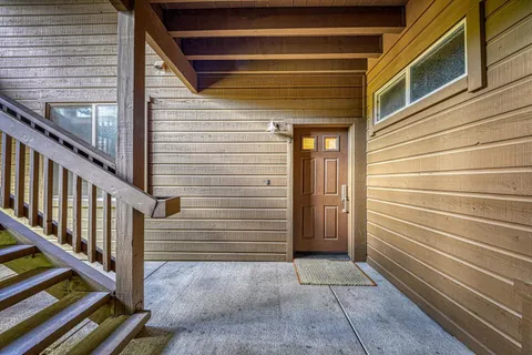 a view of a door of the house with a door