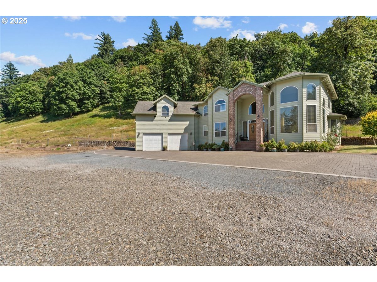 5122 Southeast Jenne Road Portland, OR 97236 - Photo 2 of 36 a front view of a house with a yard