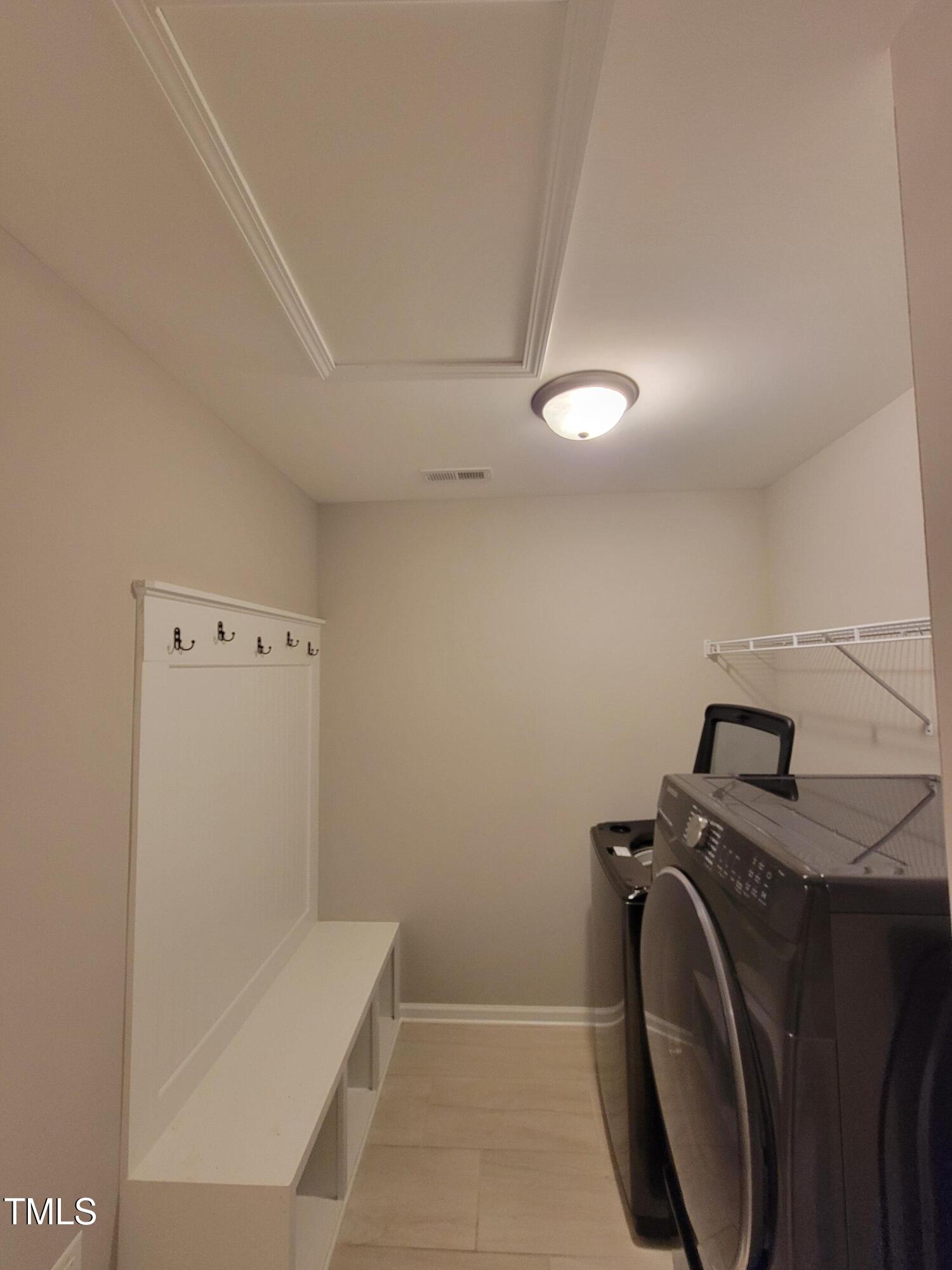 72 Mountain View Drive Garner, NC 27529 - Photo 11 of 22 a view of a storage & utility room with washer and dryer