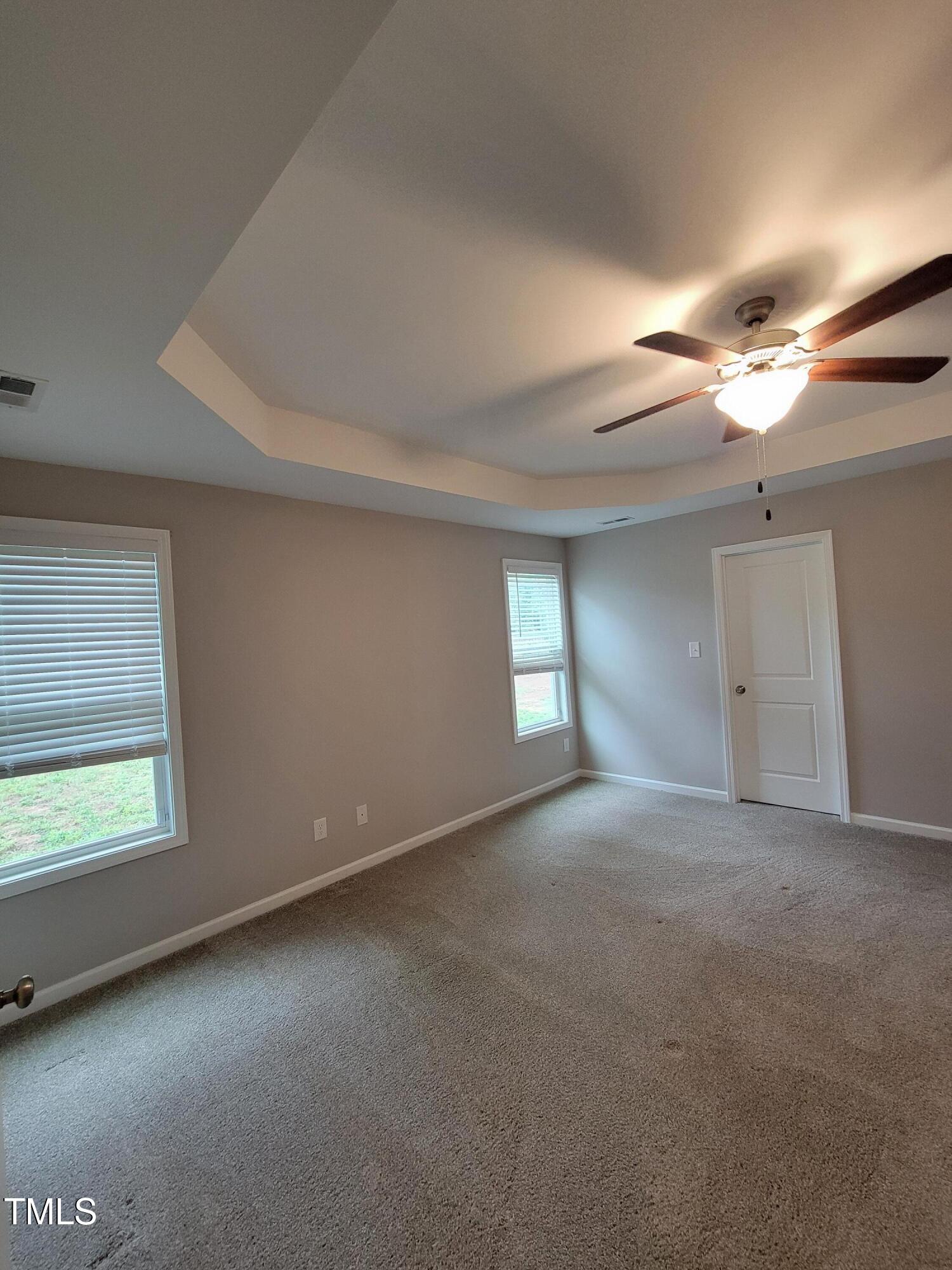 72 Mountain View Drive Garner, NC 27529 - Photo 13 of 22 a view of an empty room with a window