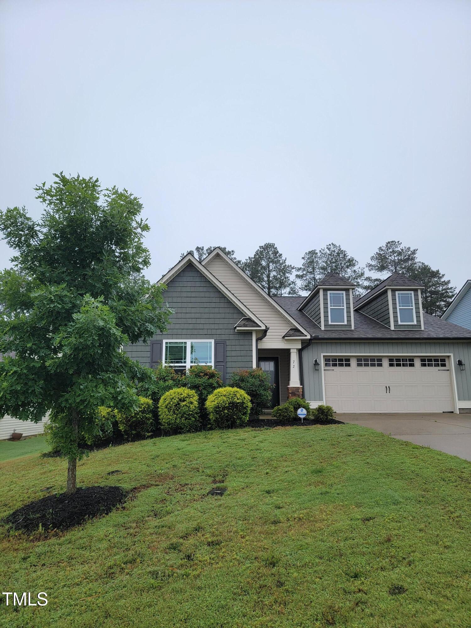 72 Mountain View Drive Garner, NC 27529 - Photo 2 of 22 a front view of house with yard and green space