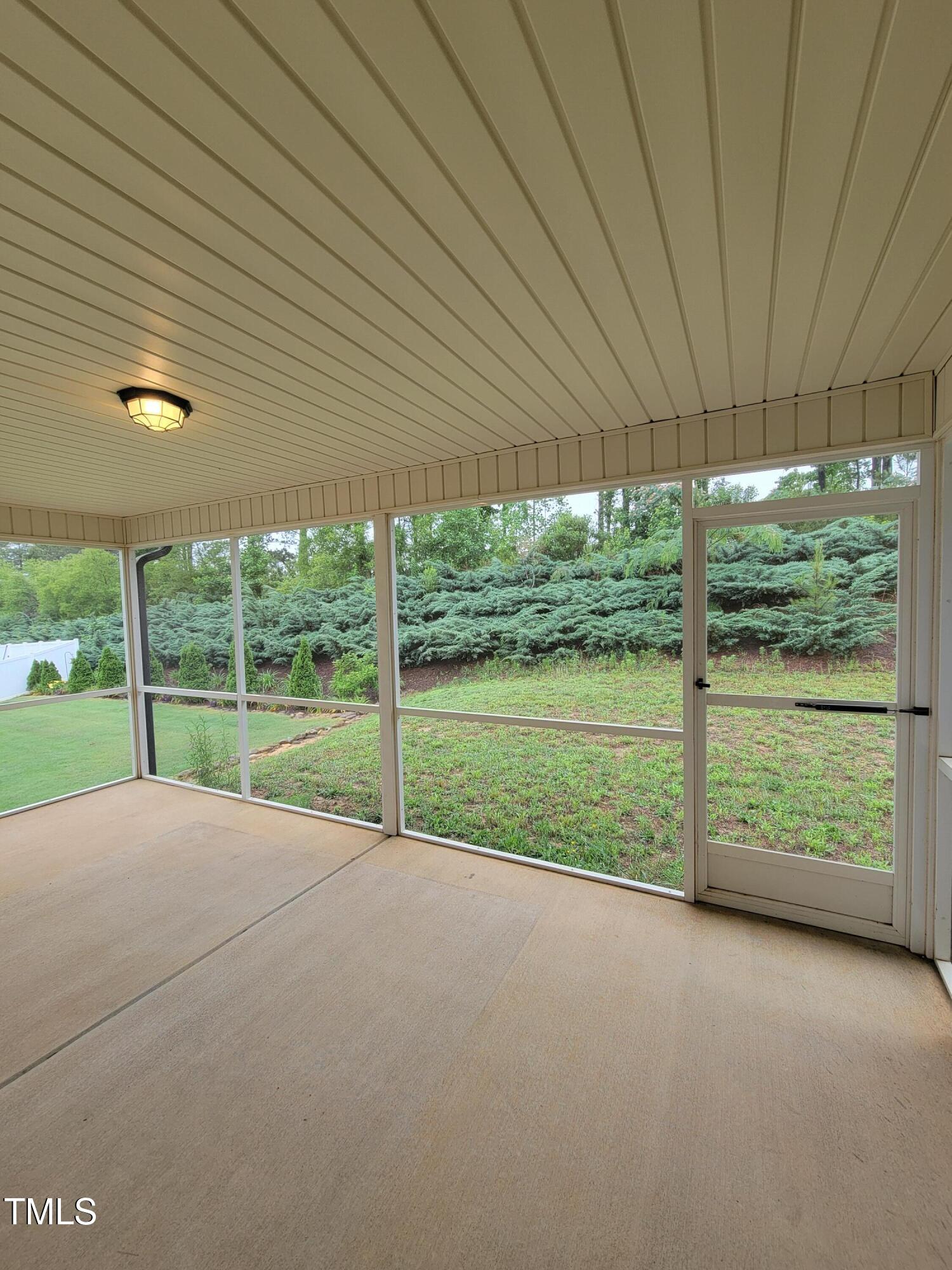 72 Mountain View Drive Garner, NC 27529 - Photo 21 of 22 a view of a house with porch and garden