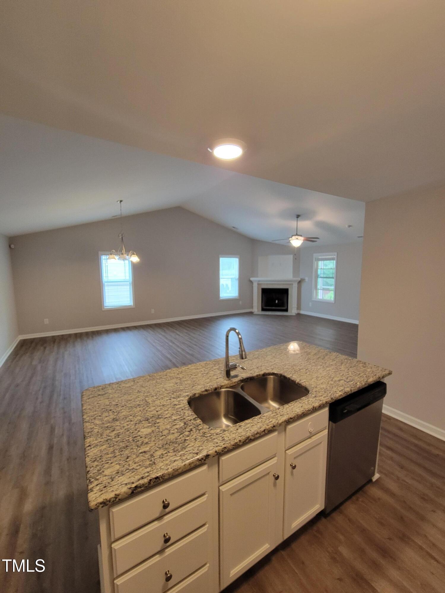 72 Mountain View Drive Garner, NC 27529 - Photo 4 of 22 a kitchen with sink and cabinets