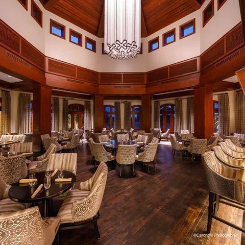 a group of cars parked in front of building