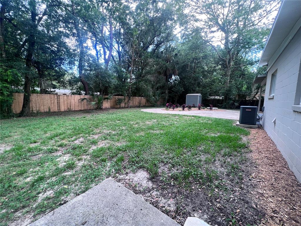 3857 West University Avenue Gainesville, FL 32607 - Photo 17 of 17 a view of a backyard with a sitting area