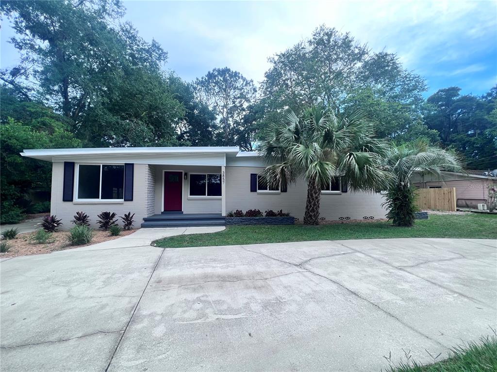 3857 West University Avenue Gainesville, FL 32607 - Photo 2 of 17 front view of a house with a patio