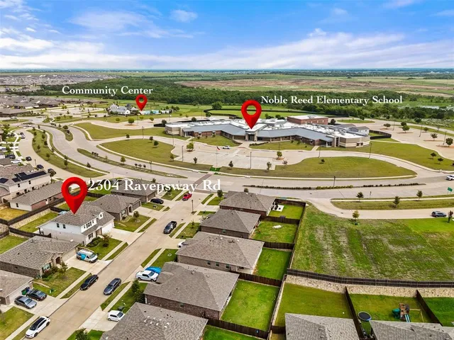 a view of a swimming pool with a lounge chairs