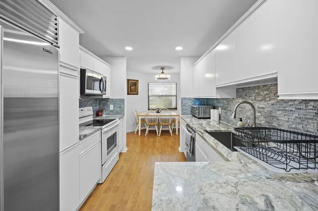 $325,000 | 1519 Woodbridge Lakes Circle, West Palm Beach, FL 33406