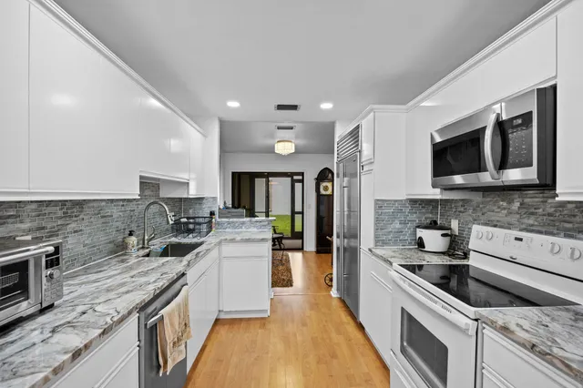 $325,000 | 1519 Woodbridge Lakes Circle, West Palm Beach, FL 33406