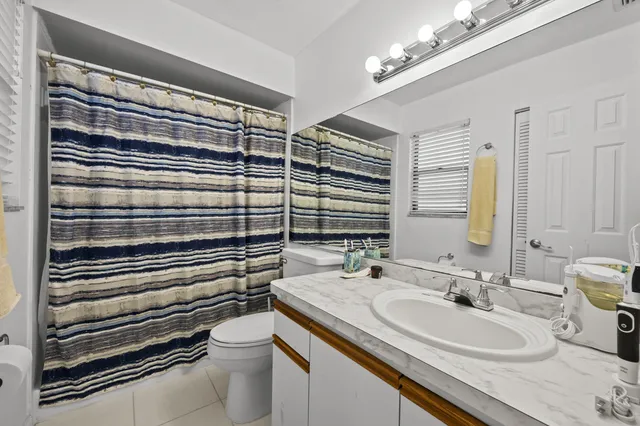 $325,000 | 1519 Woodbridge Lakes Circle, West Palm Beach, FL 33406