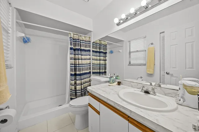 $325,000 | 1519 Woodbridge Lakes Circle, West Palm Beach, FL 33406