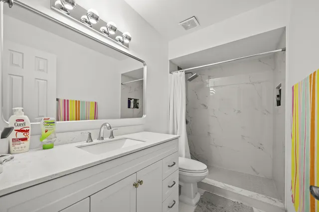 $325,000 | 1519 Woodbridge Lakes Circle, West Palm Beach, FL 33406