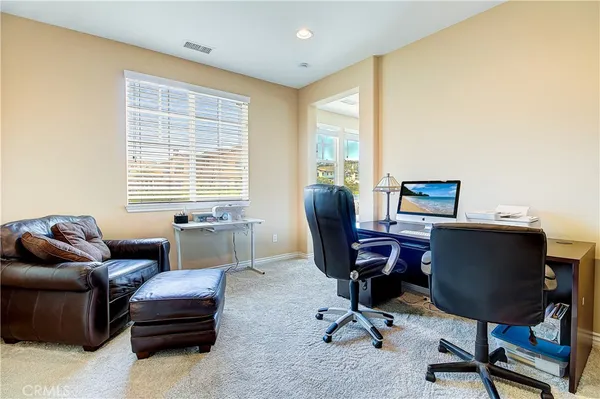 a view of workspace with gym equipment