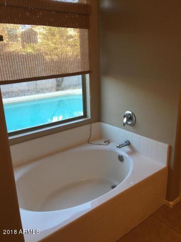 12702 West Boca Raton Road El Mirage, AZ 85335 - Photo 12 of 18 master bath has garden tub & shower