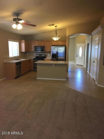12702 West Boca Raton Road El Mirage, AZ 85335 - Photo 5 of 18 family rm looking into kitchen