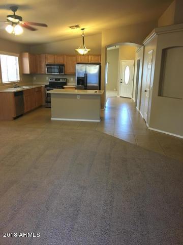 12702 West Boca Raton Road El Mirage, AZ 85335 - Photo 7 of 18 family rom to kitchen view 2