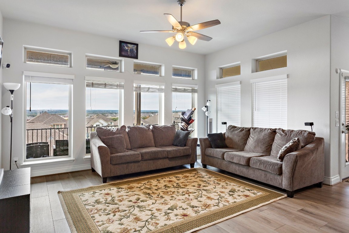 321 Berkeley Place Georgetown, TX 78628 - Photo 5 of 23 a living room with furniture and a rug