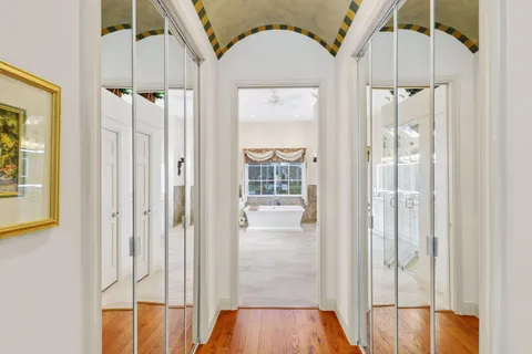 a view of a livingroom with workspace and a window
