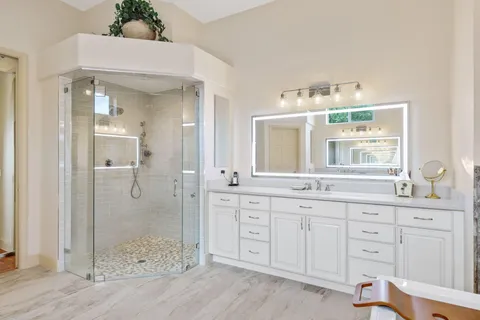 a view of a patio with a table chairs and a backyard