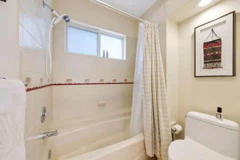 a view of a backyard with sitting area