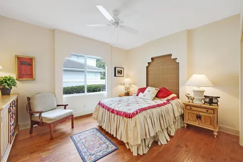 a view of a house with backyard and a patio