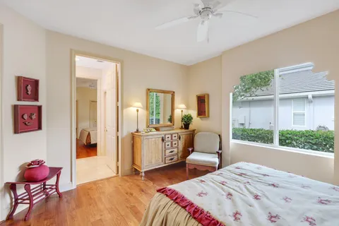 a view of a chairs and table in backyard