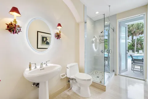 a view of a garden with a table and a lake view