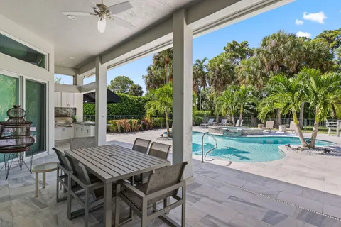 an aerial view of a house with a garden