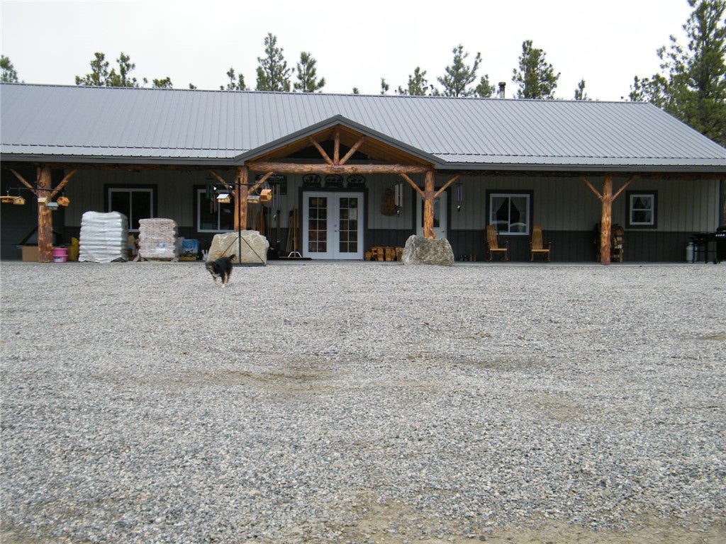 FRONT OF HOME AND WAREHOUSE 10FT X 80FT COVERED PORCH