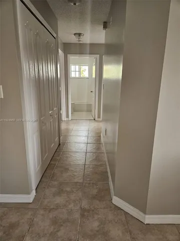 a view of hallway with shower