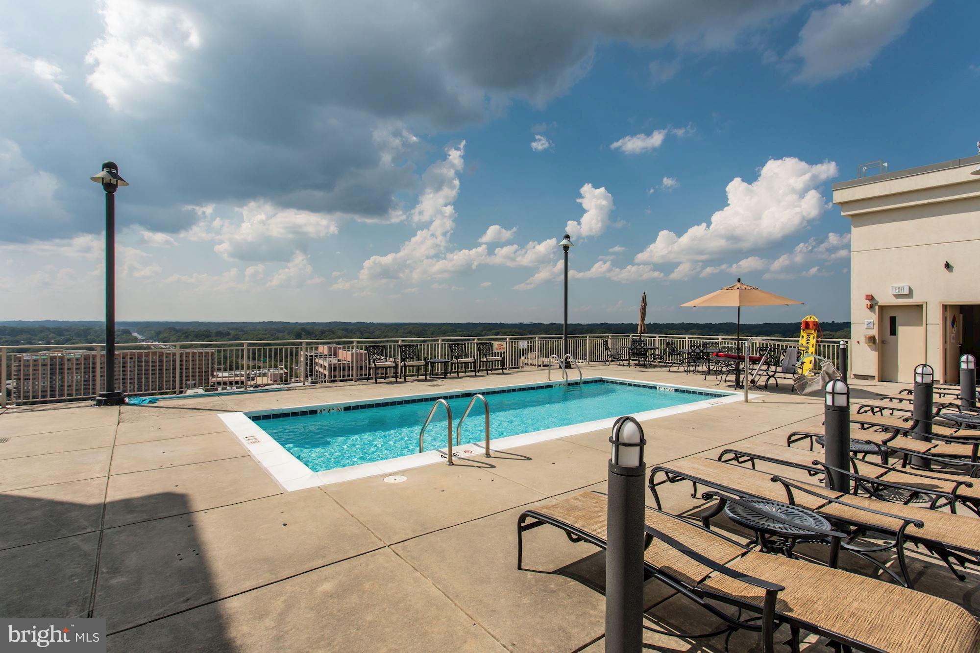 2726 Gallows Road, Unit 1315 Vienna, VA 22180 - Photo 8 of 30 a view of a swimming pool with seating space