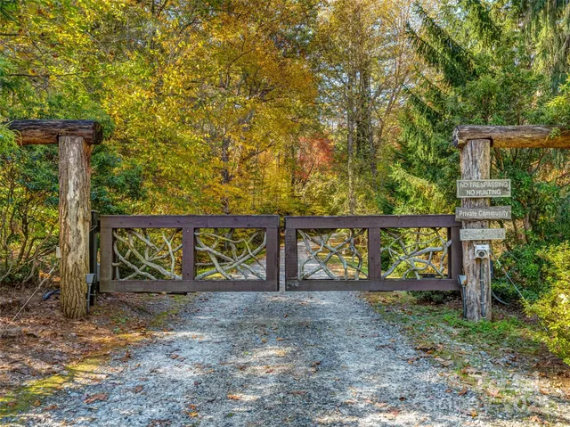 a view of a sign board with a small yard
