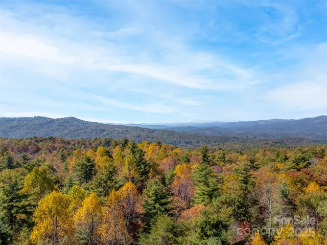 a view of an aerial view of residential houses with outdoor space