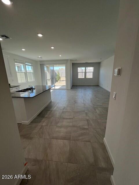 26443 West Crown King Road Buckeye, AZ 85326 - Photo 13 of 25 Hall entry to Kitchen & Living