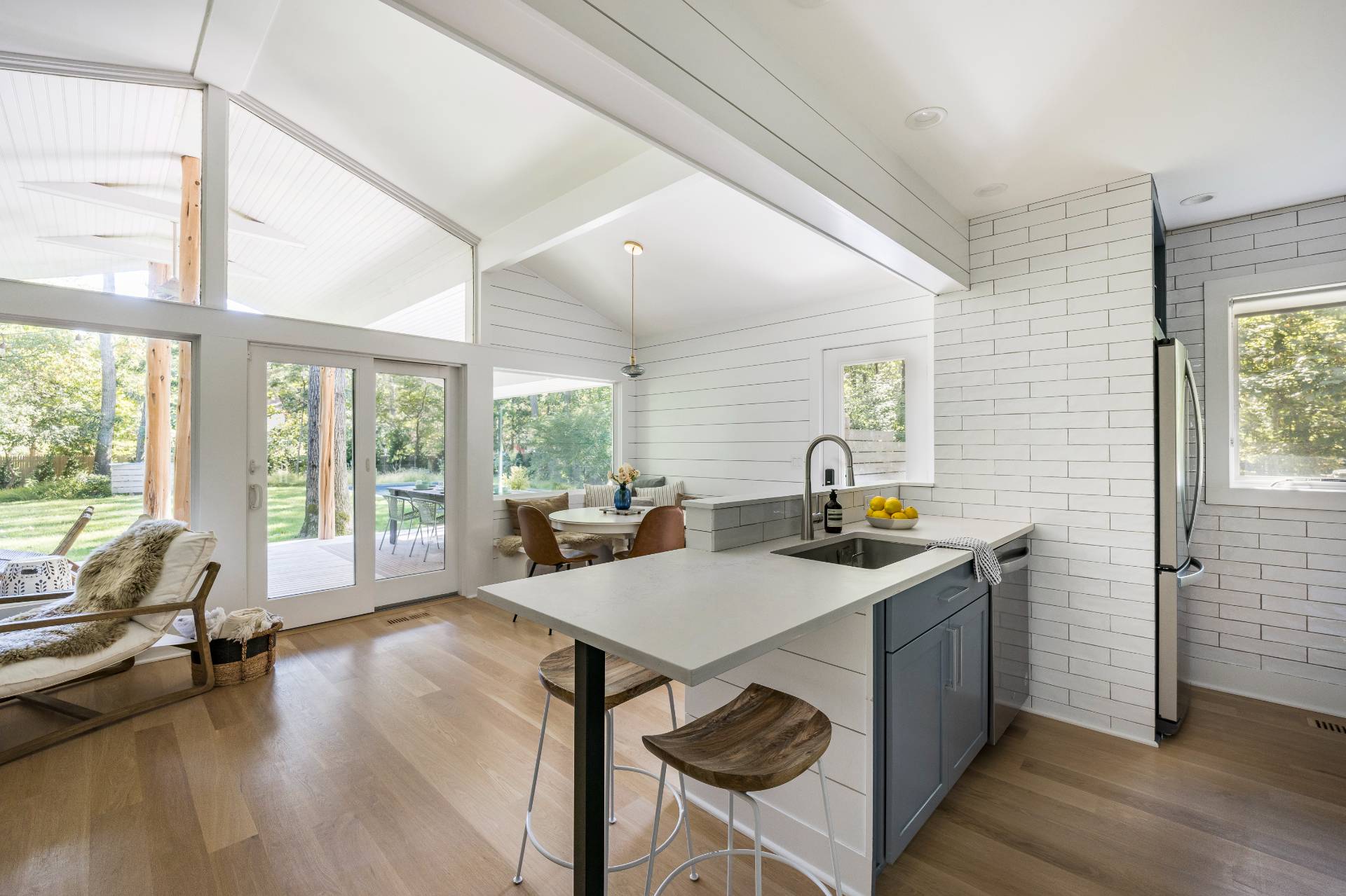 49 Sherwood Lane East Hampton, NY 11937 - Photo 13 of 19 a view of a dining room with furniture window and outside view