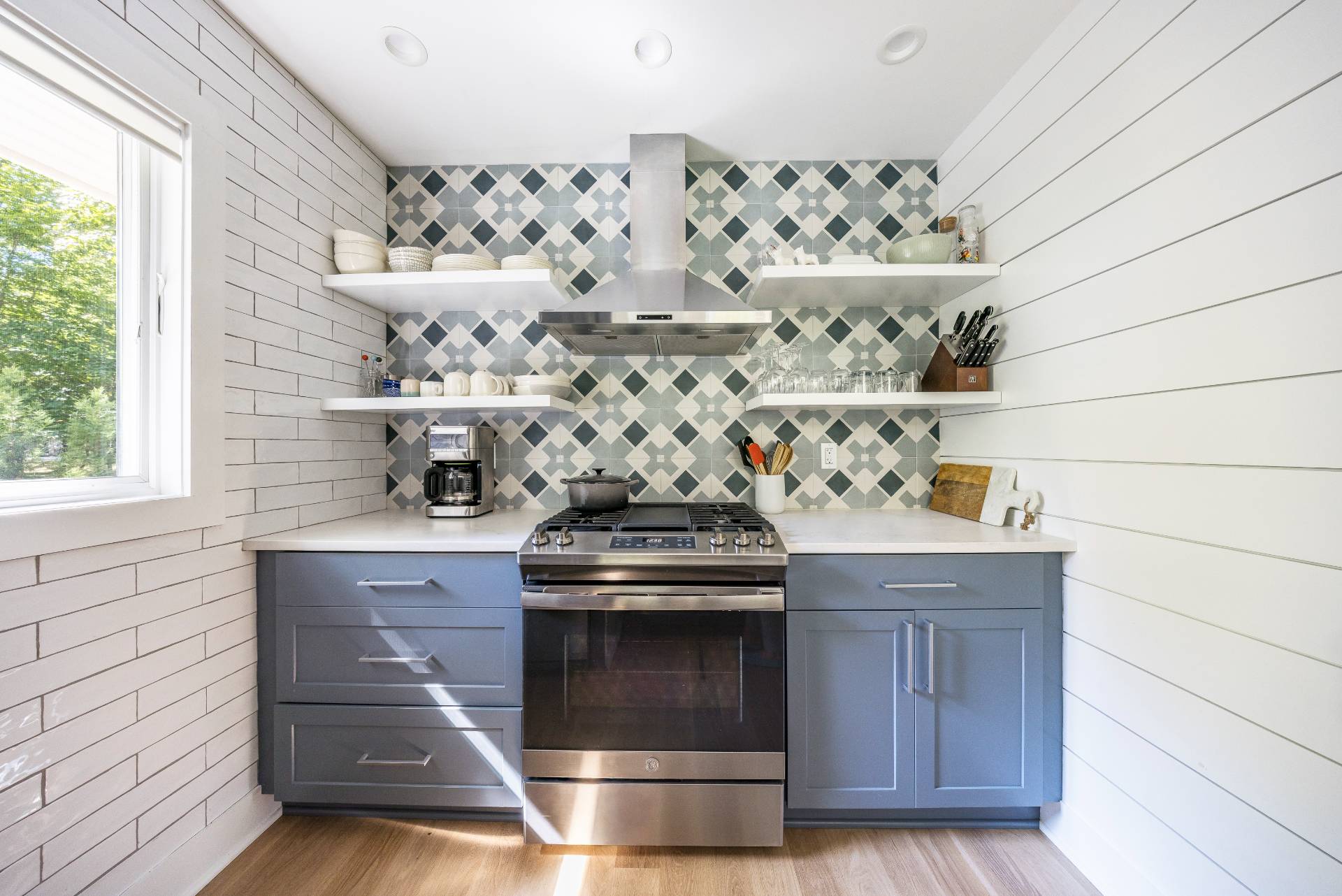 49 Sherwood Lane East Hampton, NY 11937 - Photo 15 of 19 a stove top oven sitting inside of a kitchen