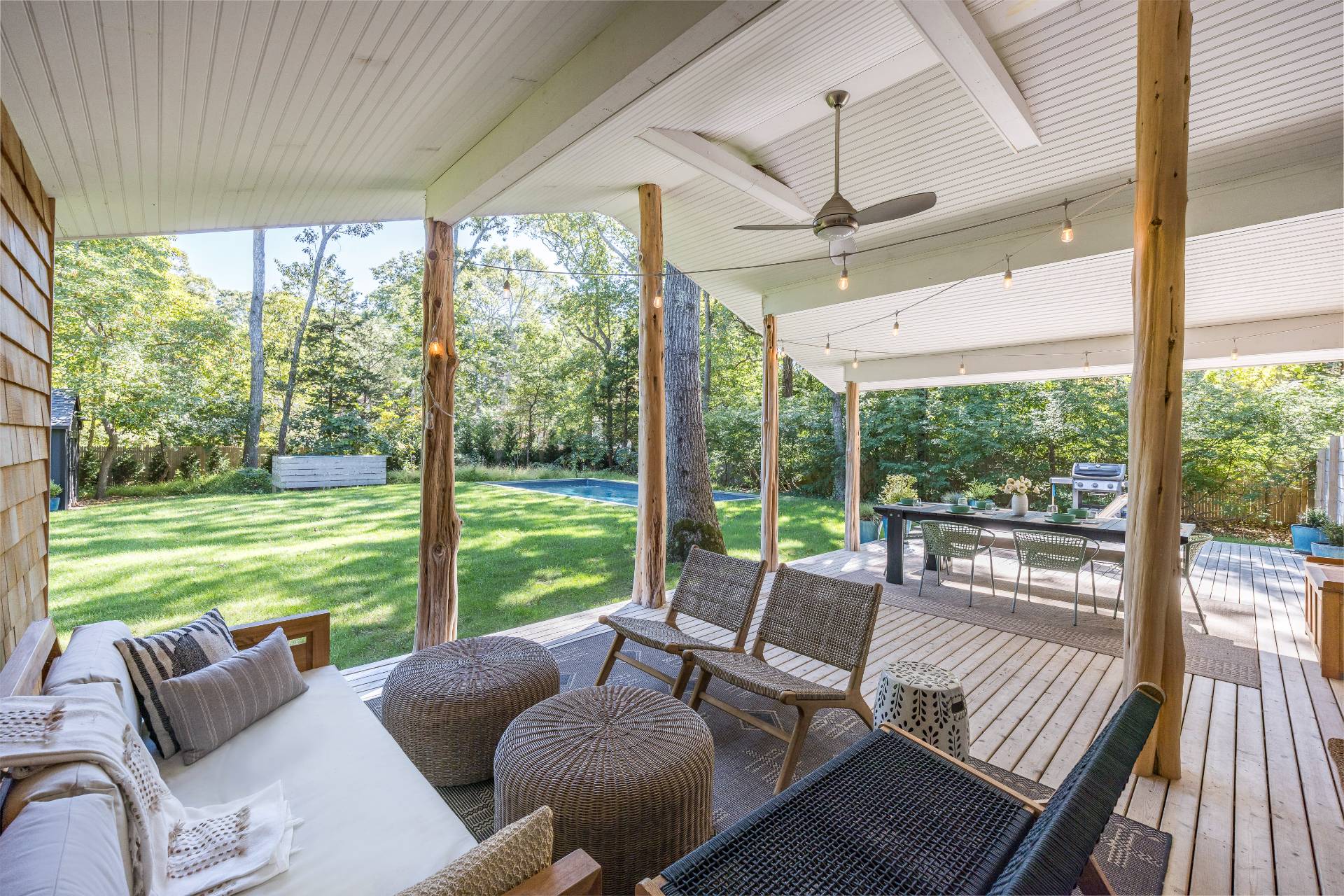 49 Sherwood Lane East Hampton, NY 11937 - Photo 4 of 19 a living room with furniture and floor to ceiling windows