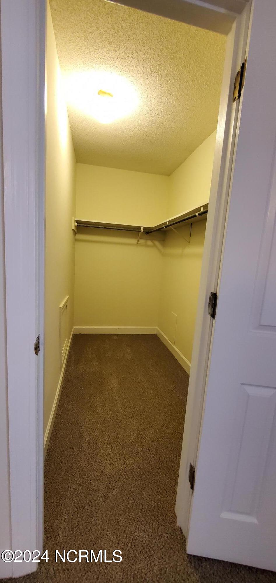 1827 Quail Ridge Road Greenville, NC 27858 - Photo 17 of 21 2nd Bedroom closet - nice size.