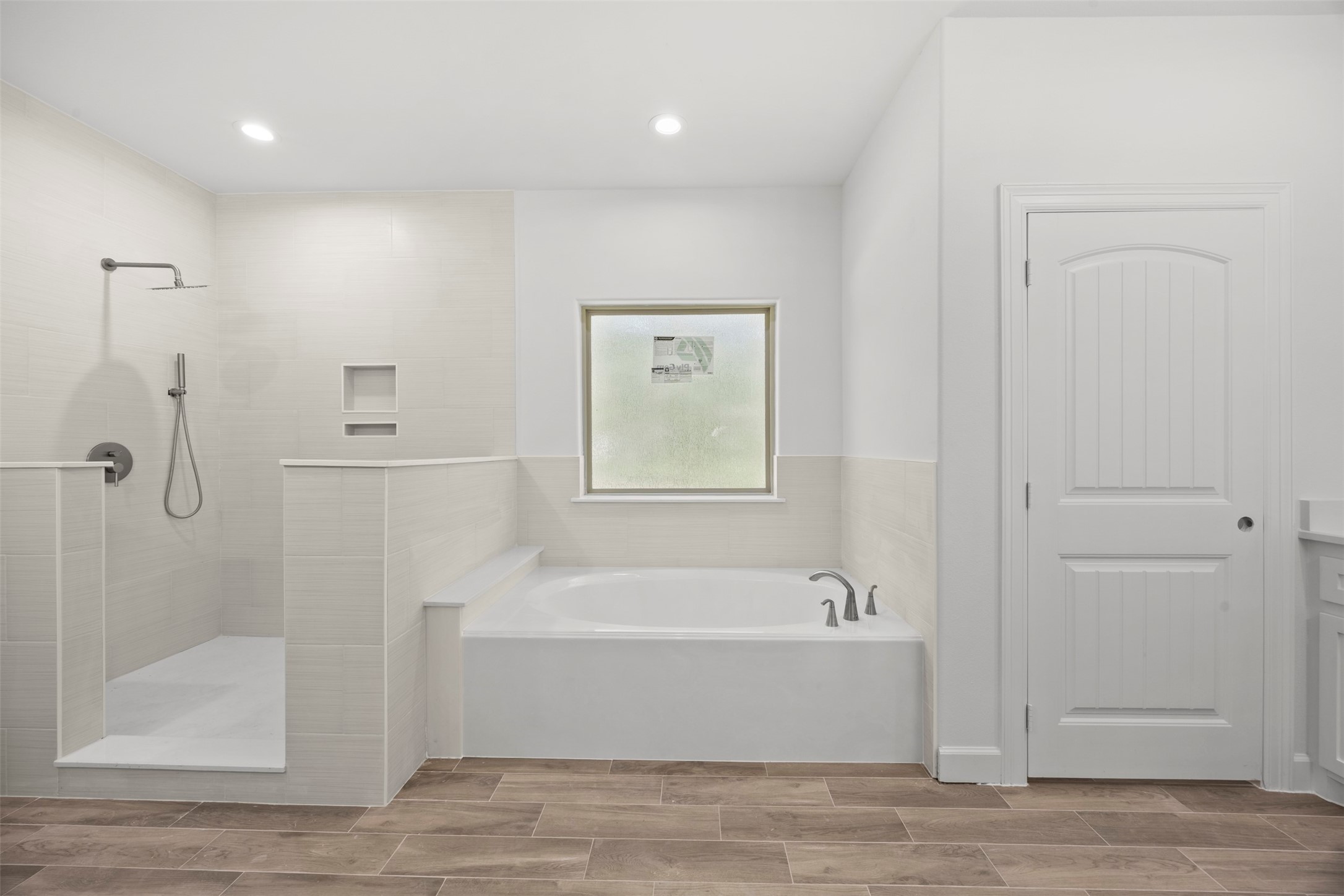 183 Windmill Road Huntsville, TX 77340 - Photo 30 of 47 Primary bath with soaker tub and walk in shower (glass to be added)
