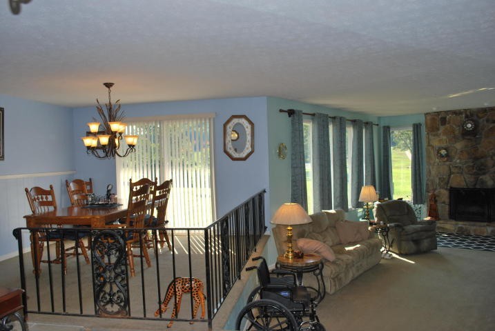 2736 East Raccoon Valley Drive Heiskell, TN 37754 - Photo 5 of 37 a view of a dining room with furniture window and outside view